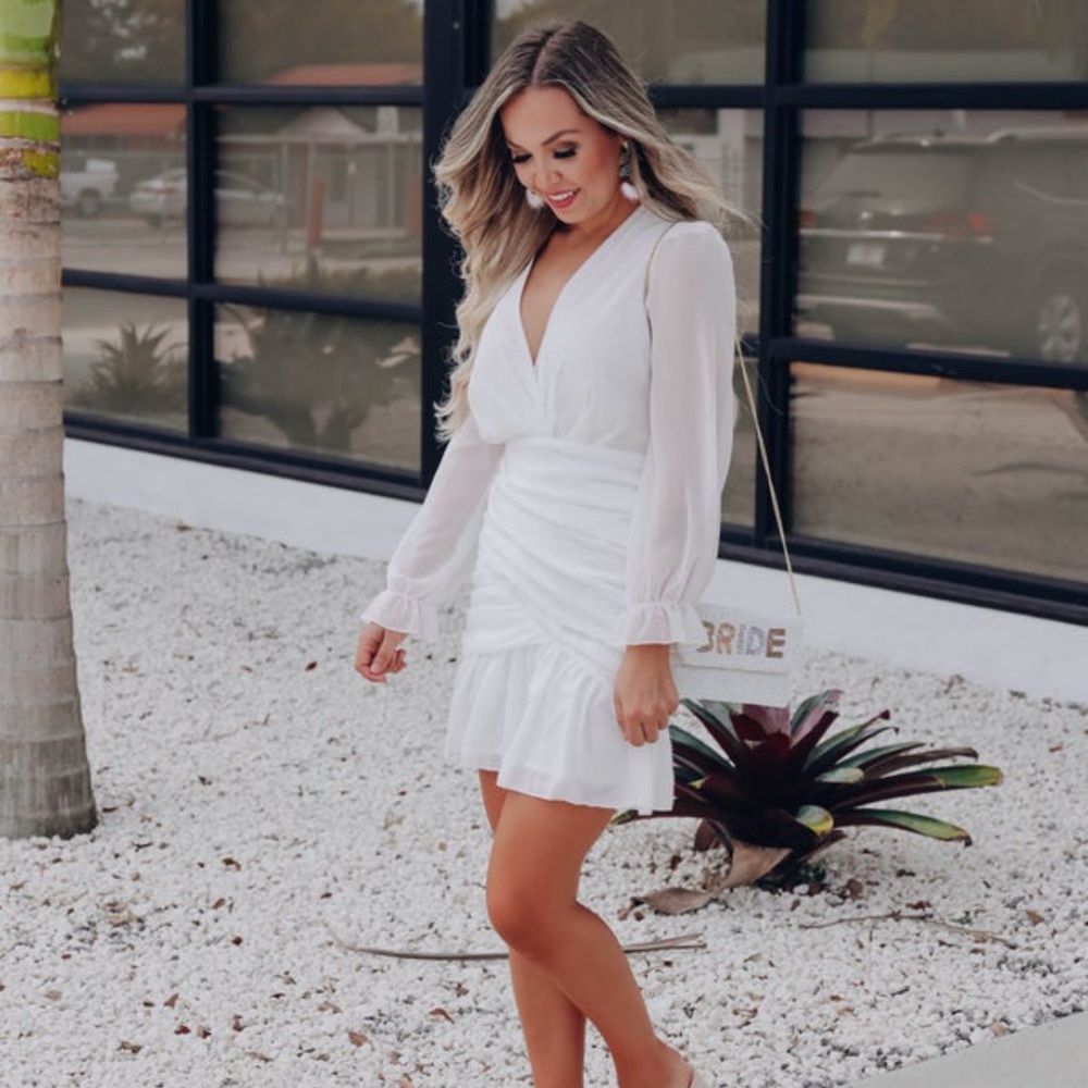 Long-sleeved ruched white dress